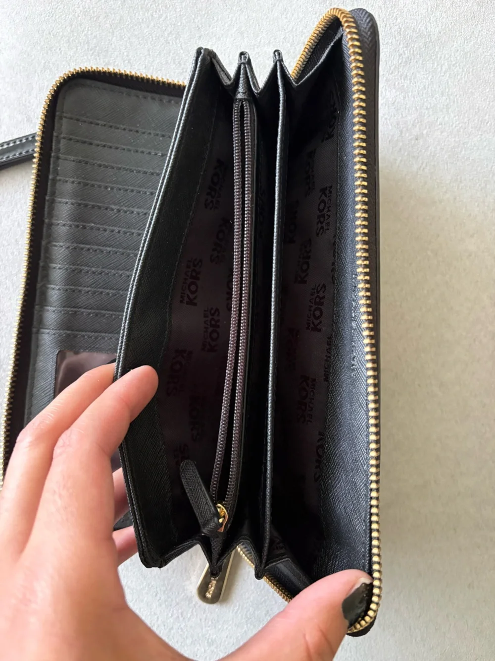Michael Kors Black Patent Logo Zip Wristlet with Gold Plate